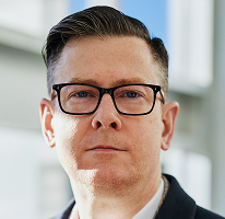 Alexander Hughes, Geschäftsführer eines Kryptowährungshandelsunternehmens, Headshot